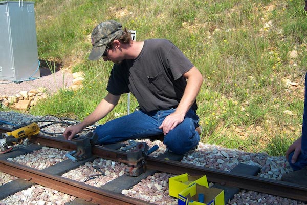 04_Alex setting up to bond some rail!