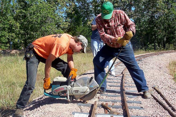 03 - George Cotner assisting Alex Beams in cutting a rail on the inner loop 10-2-08